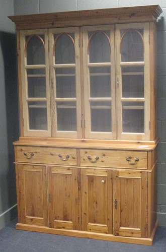 Lot 535 - A stripped/waxed pine glazed top cabinet, 20th...