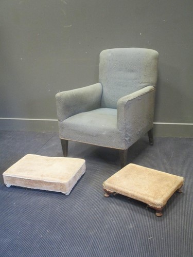 Lot 623 - A modern deep armchair on square tapered legs...