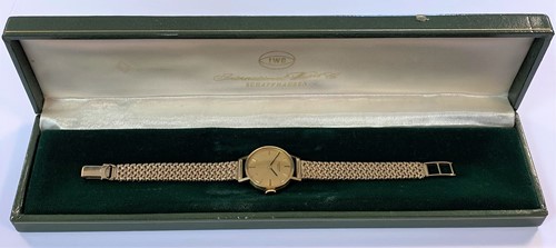 Lot 275 - IWC - A lady's 18ct gold wristwatch on a later 9ct gold bracelet