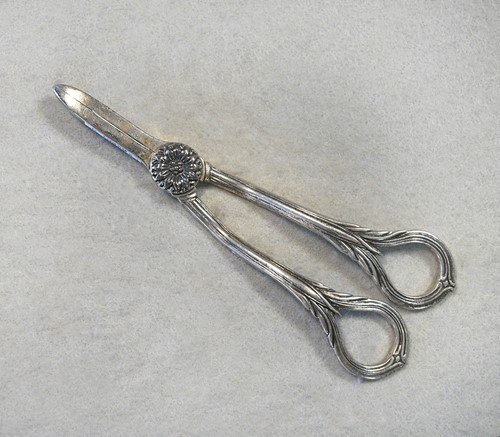 Lot 475 - A pair of late 20th century silver grape scissors, mark of Asprey & Co Ltd.