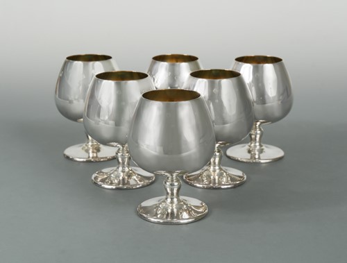Lot 473 - A set of six 20th century parcel gilt silver brandy balloons, mark of Garrard & Co.