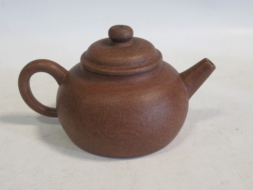 Lot 135 - Yixing teapot, brown colour, seal mark to base