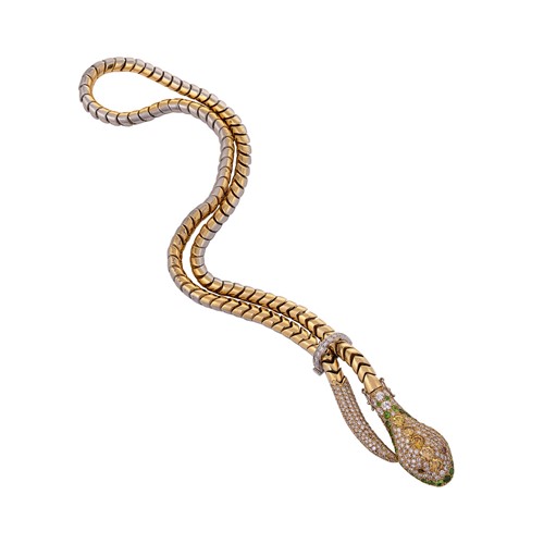 Lot 194 - A modern 'snake' style lariat, set with green garnet, white and fancy coloured diamonds