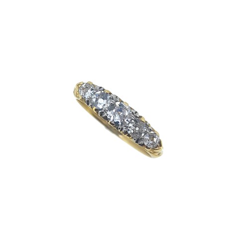 Lot 238 - An early 20th century diamond carved half hoop ring