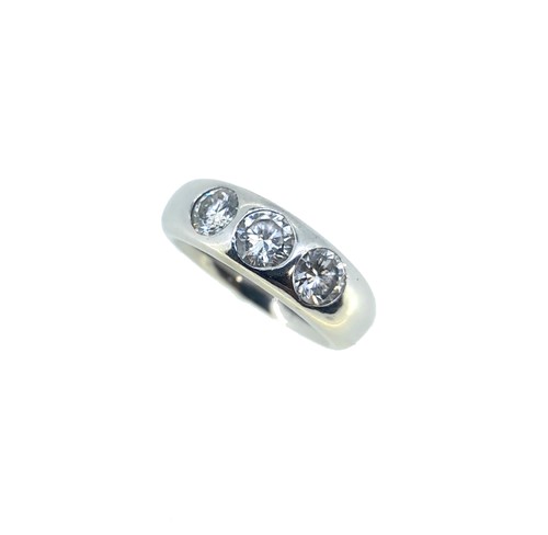 Lot 224 - A platinum three stone diamond ring