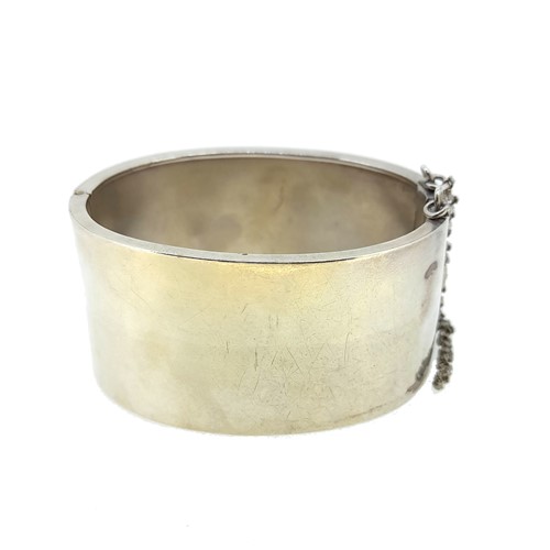 Lot 5 - A floral cuff bangle