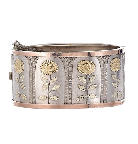 Lot 5 - A floral cuff bangle