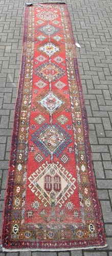 Lot 591 - A Karabagh style wool runner. 448 x 45 cm...