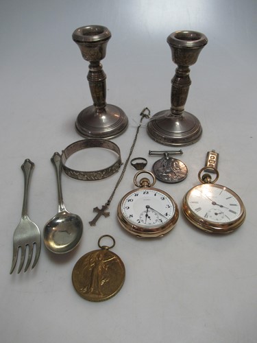 Lot 275 - A pair of silver dwarf candlesticks together...