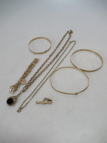 Lot 230 - Three hallmarked or stamped 9ct gold bangles,...