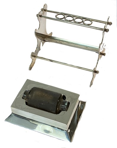 Lot 338 - A George V silver pen tidy together with an Edward VII silver stamp roller