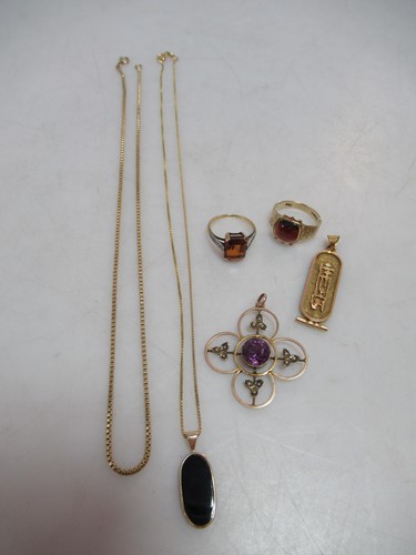 Lot 255 - An Egyptian Hieroglyphic pendant tested as...
