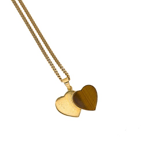 Lot 50 - A double heart tiger's eye pendant and chain