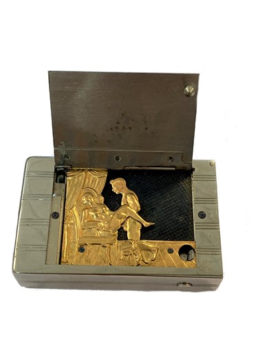 Lot 306 - A chromed vesta case with secret erotic mechanism