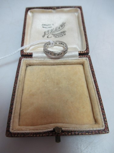 Lot 261 - An 18ct white gold full eternity ring 3.5g, cased