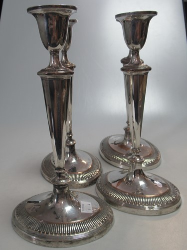 Lot 295 - A set of four silver plated on copper...
