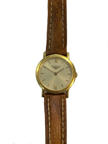 Lot 276 - Longines - A lady's 18ct gold wristwatch