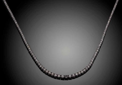 Lot 261 - A graduated diamond rivière necklet