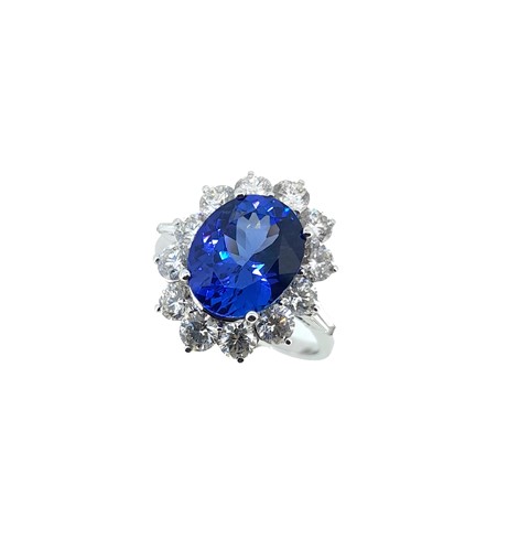 Lot 217 - A tanzanite and diamond cluster ring set in 18ct white gold