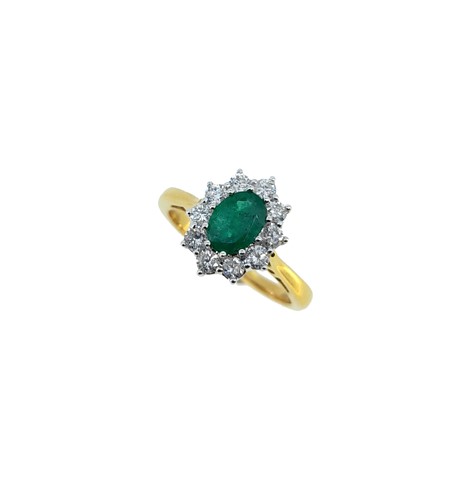 Lot 98 - An emerald and diamond cluster ring