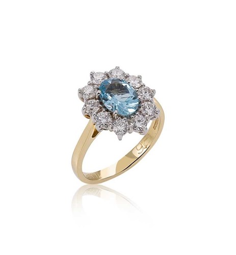 Lot 65 - An aquamarine and diamond cluster ring