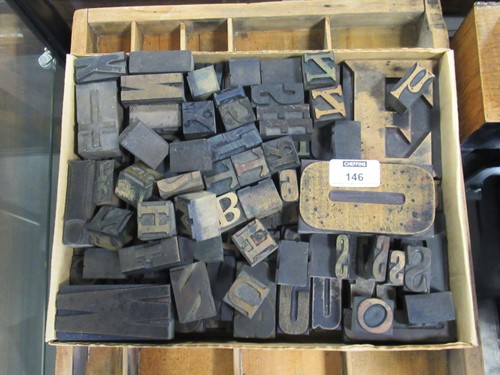 Lot 146 - A quantity of alphabetic printing blocks,...