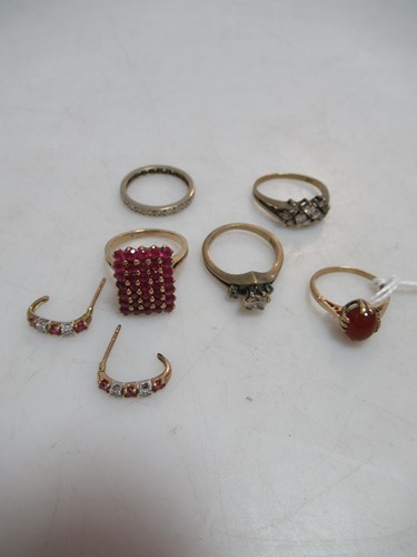 Lot 272 - A collection of four dress rings marked '9ct',...