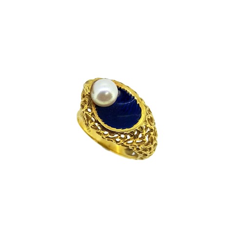 Lot 107 - A modern enamel and pearl ring