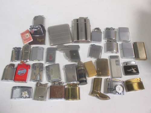 Lot 194 - A collection of lighters to include...