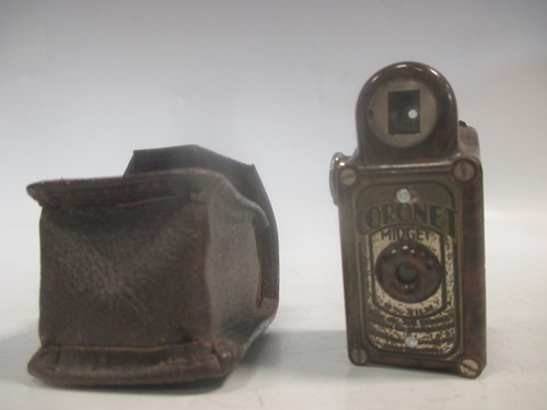 Lot 139 - A Coronet Midget Miniature Camera, brown...