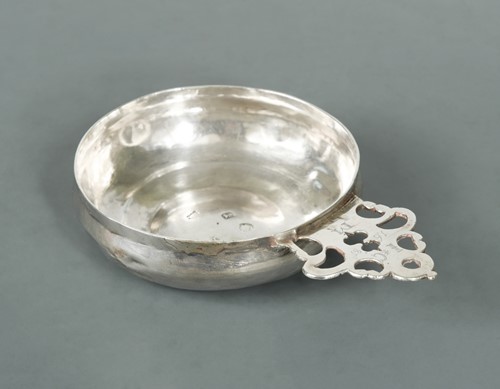 Lot 385 - A Charles II silver bleeding bowl