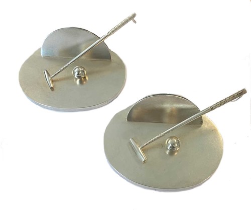 Lot 342 - A pair of George V silver novelty menu holders, mark of Garrard & Co