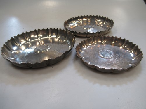 Lot 301 - Three silver ashtrays