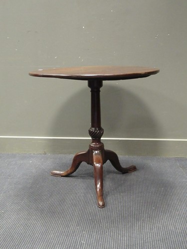 Lot 472 - Two circular mahogany tripod tables, 19th...