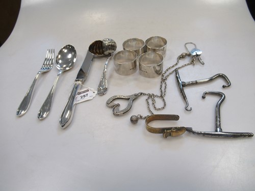 Lot 297 - 4 silver napkin rings and a three piece...