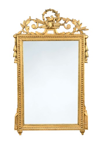 Lot 399 - An empire style carved giltwood mirror