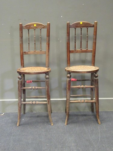 Lot 452 - A pair of 19th century correction chairs