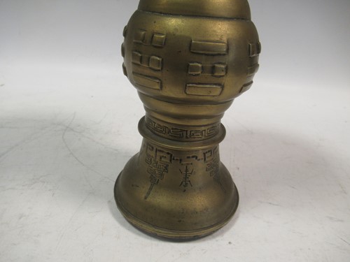 Lot 24 - A Chinese brass or bronze Gu shape vase