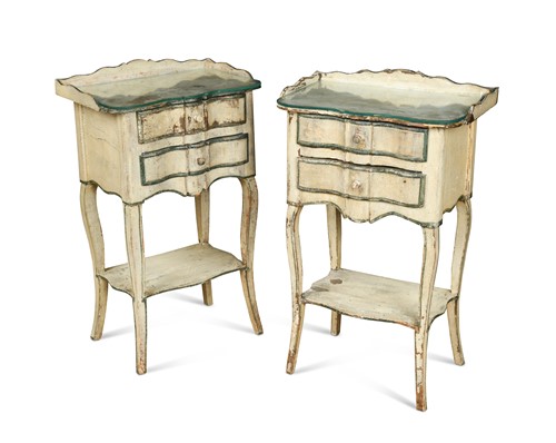 Lot 560 - A pair of cream and green painted bedside tables