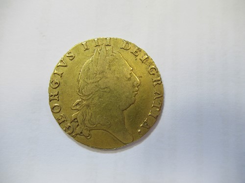Lot 268 - A George III spade Guinea, 1794