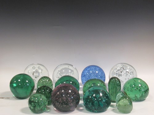 Lot 14 - A collection of glass dumps and spheres, (16)