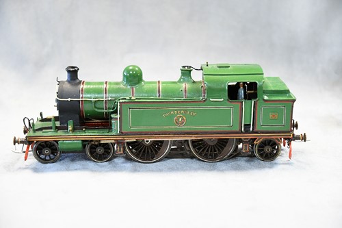 Lot 527 - A painted metal kit or scratch built model O gauge electric tank locomotive