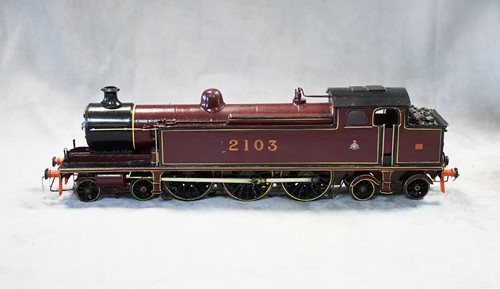Lot 523 - A painted metal kit or scratch built model O gauge electric 4-6-4 Tank locomotive