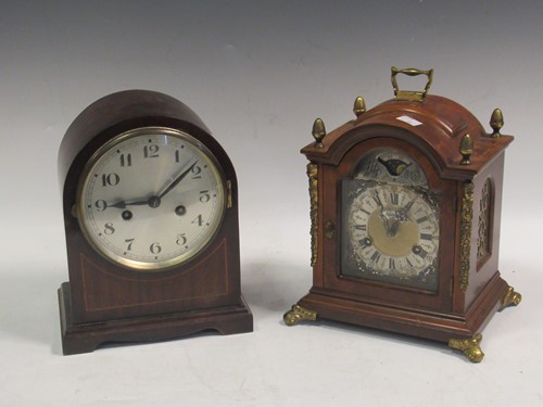Lot 138 - A reproduction walnut mantel clock with bell...