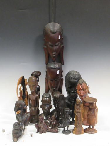 Lot 66 - A collection of carved african figures and...
