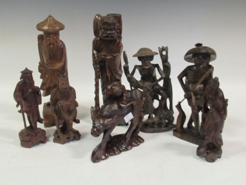 Lot 25 - A collection of antique and later carved...