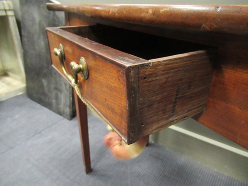 Lot 476 - A mahogany serpentine shape side table with...