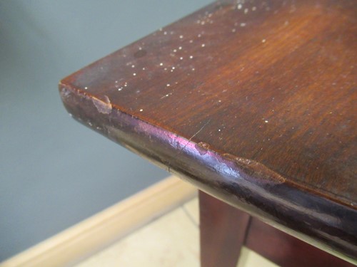 Lot 476 - A mahogany serpentine shape side table with...