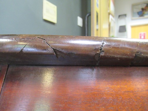 Lot 476 - A mahogany serpentine shape side table with...