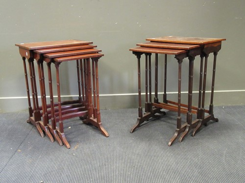 Lot 474 - Two sets of figured mahogany nests of tables,...